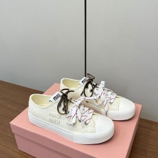 미우미우 MIUMIU 워싱 데님 스니커즈 MU014819