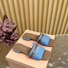 미우미우 MIUMIU 캔버스 슬라이드 뮬 MU014824
